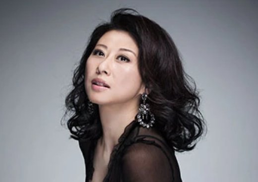 曾经为何心痛变成陌生什么歌原唱?