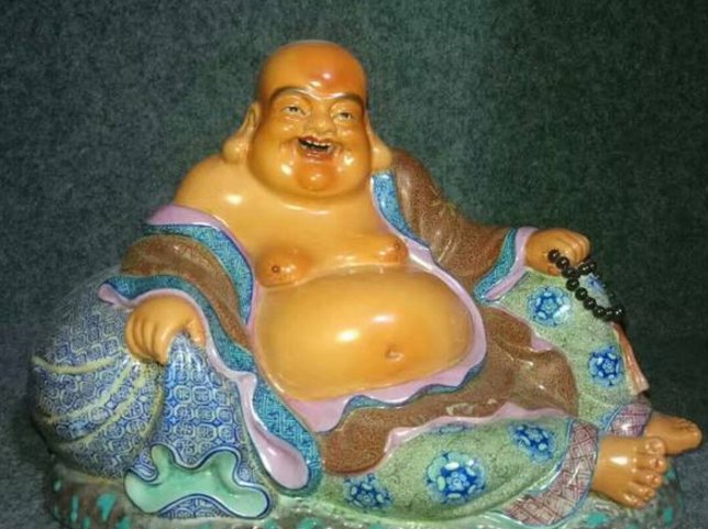 大肚能容容天下难容之事的下一句是什么？出之哪里？