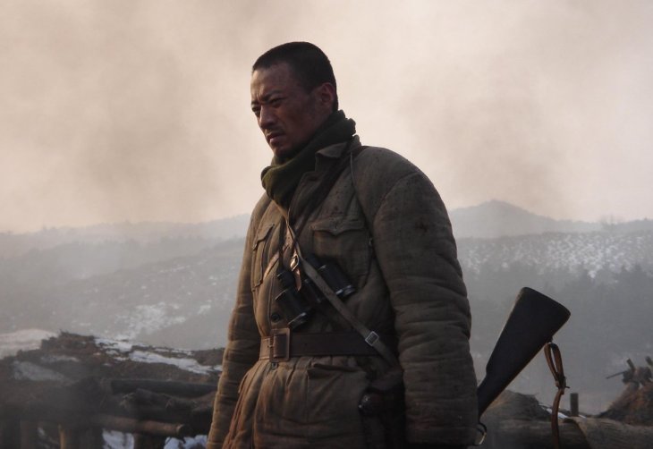 谷子地把什么留在墓碑下，作为永远的纪念？